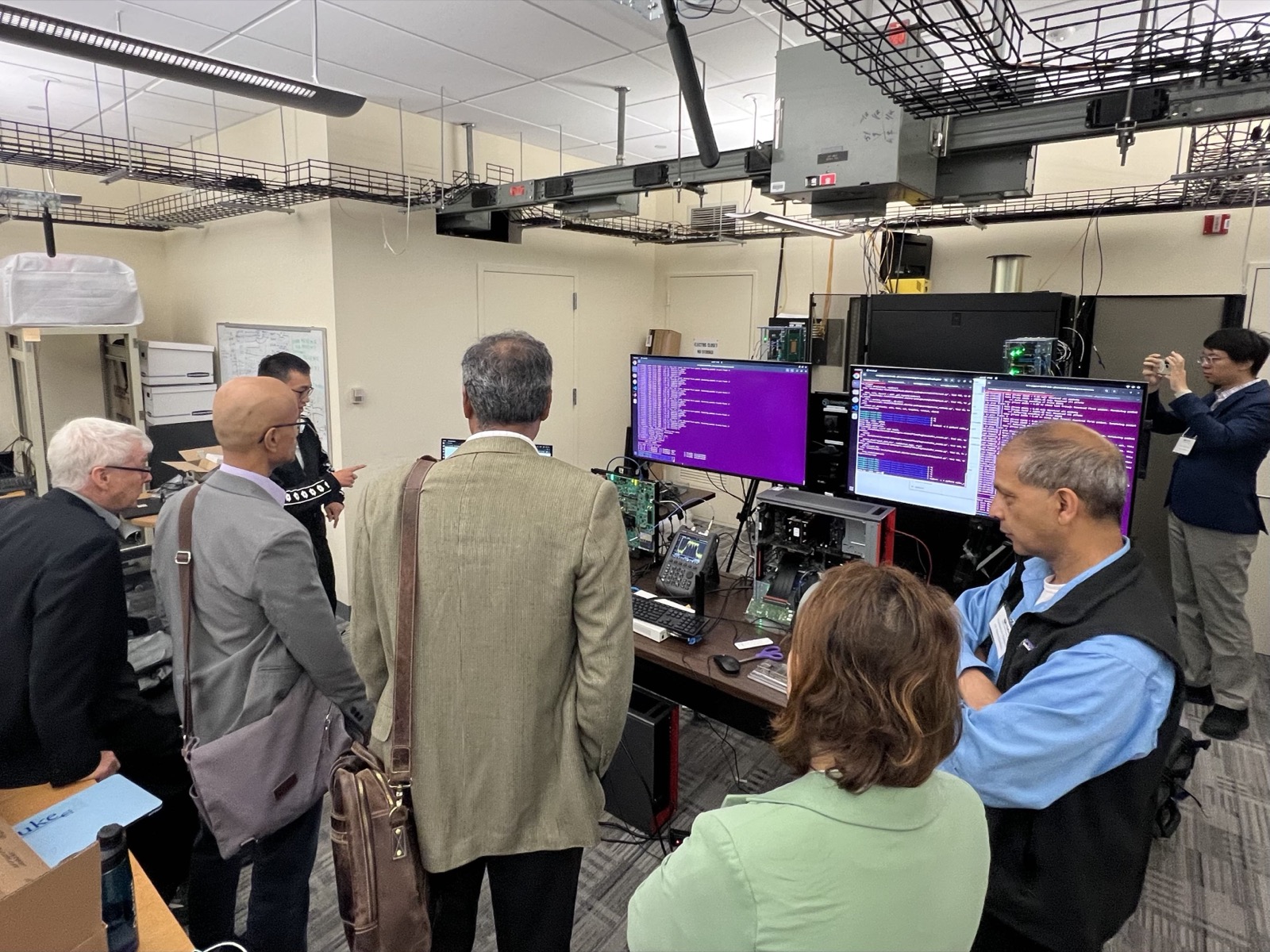 Wei presents the programmable RFSoC demo during the CUbiC Annual Review at Columbia University (June 2024)