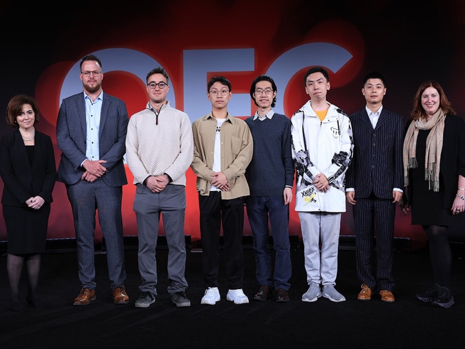 Zehao (2nd from right) joins other Corning Outstanding Student Paper Competition finalists at OFC 2024 (Mar. 2024)